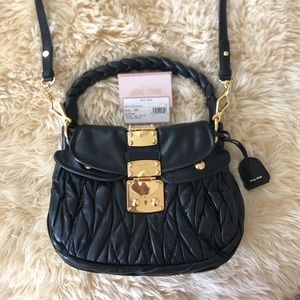 Miu Miu Matelassé Coffer Stachel in Black Leather